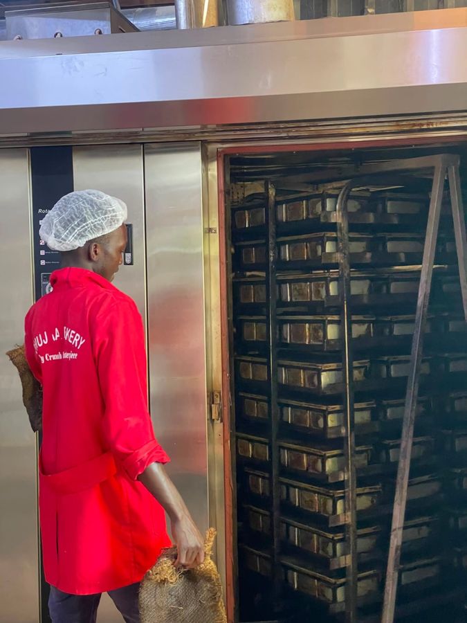 Shujaa Bakery.html Kenya 2025 — Staff Operating 32-Tray Diesel Rotary Rack Oven by R&M