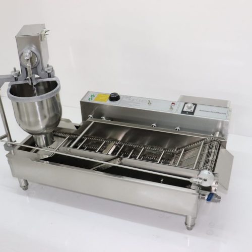 Double row commercial donut maker machine frying golden ring donuts in oil tank