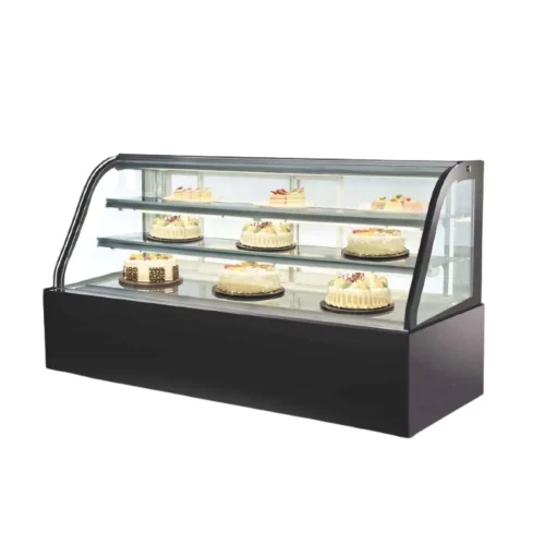Full front view of R&M RMXK curved glass refrigerated cake showcase white base 2 levels