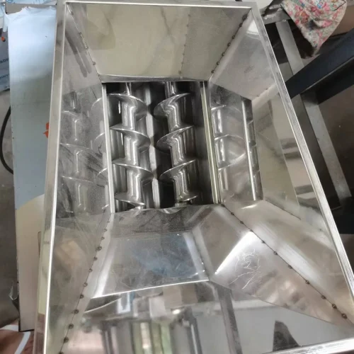R&M dough cutter machine hopper with dual screw augers — continuous dough feed