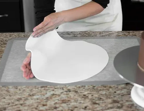 Fondant sheet output from R&M electric fondant sheeter machine