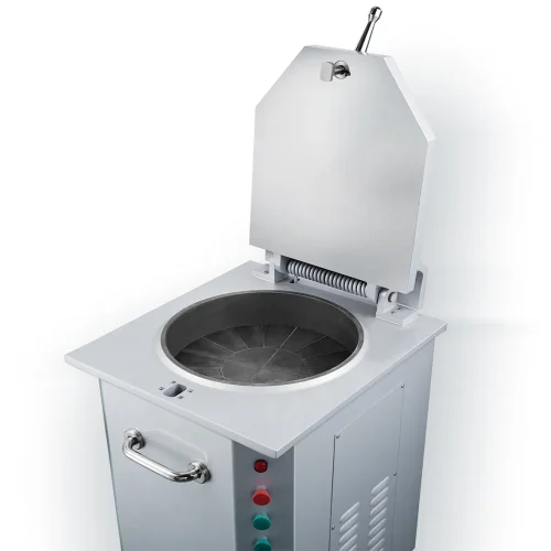 Open chamber of R&M hydraulic dough divider with segmented dividing plate and hinged lid