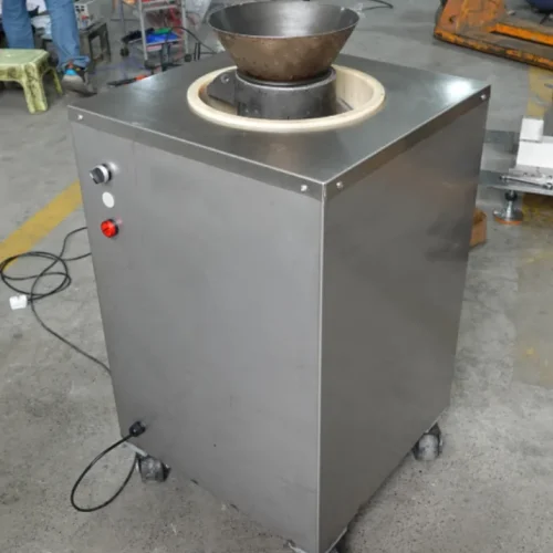 R&M large dough rounder in workshop — stainless steel body with conical bowl and casters