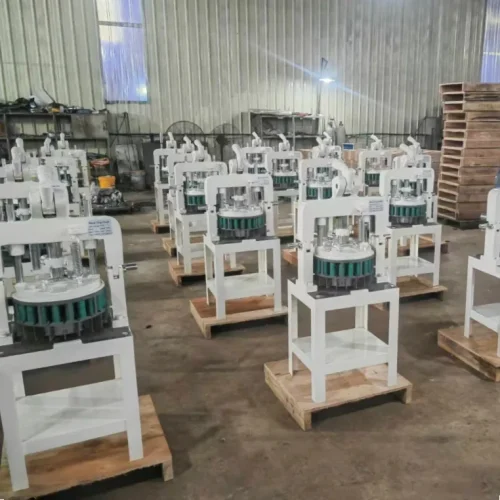 R&M manual dough dividers lined up on factory floor — commercial production batch
