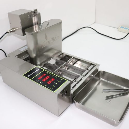 Commercial mini donut machine producing fresh mini donuts auto flip conveyor output