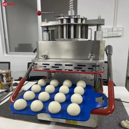 R&M tabletop dough divider rounder on workbench with dough balls tray 220V