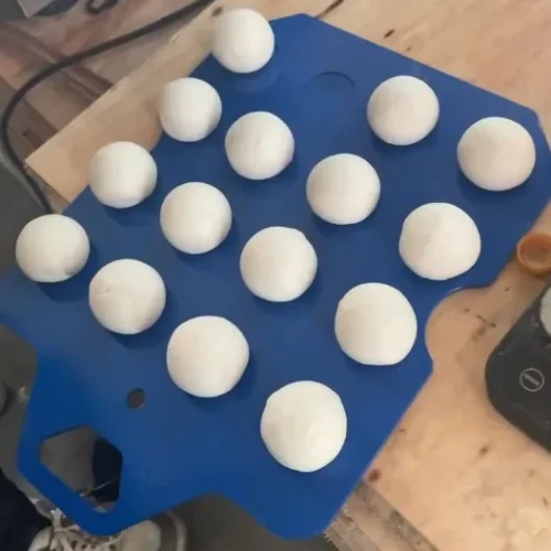 Evenly rounded dough balls from R&M tabletop semi-auto dough divider rounder
