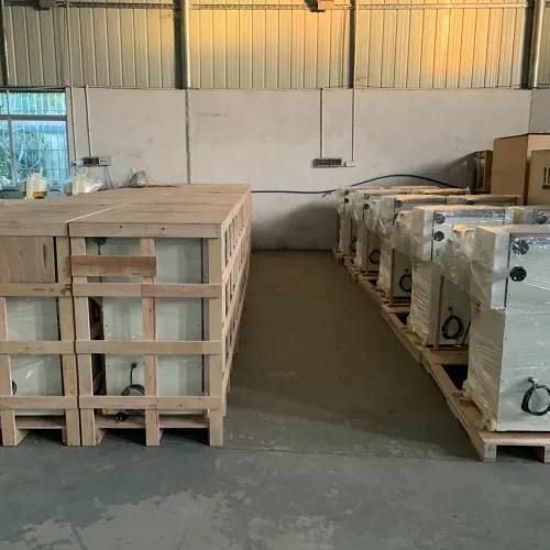 R&M RMZ-380 toast moulder export crates and wrapped units in warehouse