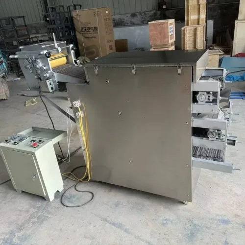 R&M tortilla production line installation in warehouse with control cabinet