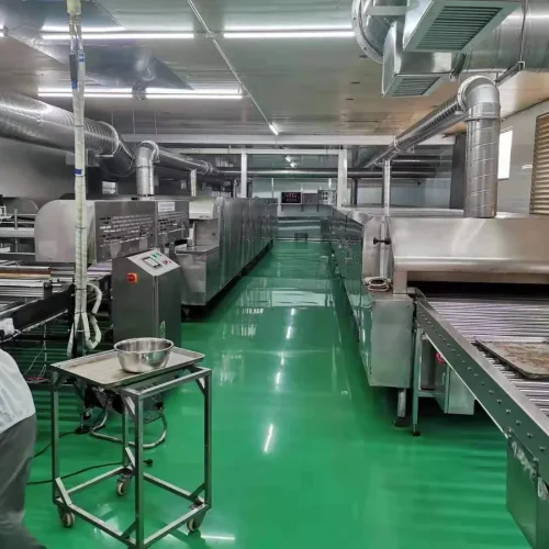 Industrial tunnel oven exterior side view — stainless steel panel construction