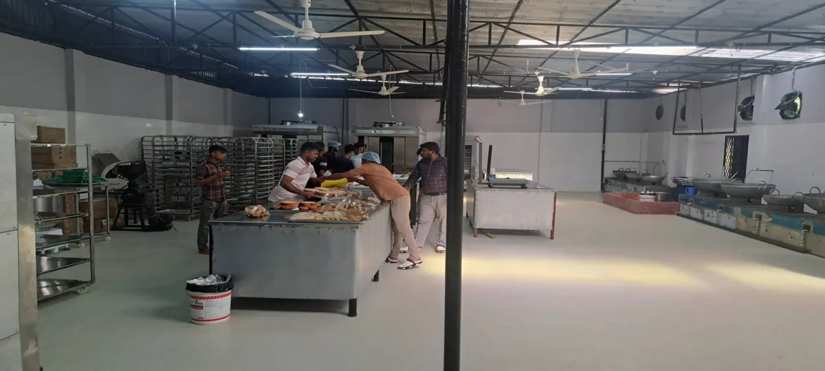 Sweet Basket bakery production floor in Chattogram with rotary ovens and trolley racks