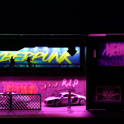 Full scene presentation of cyberpunk garage diorama with die-cast model placement