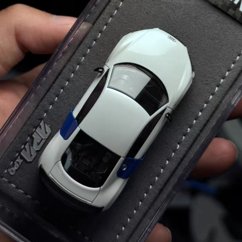 Hand‑held shot of GRYNING 1/64 GT collectible car model