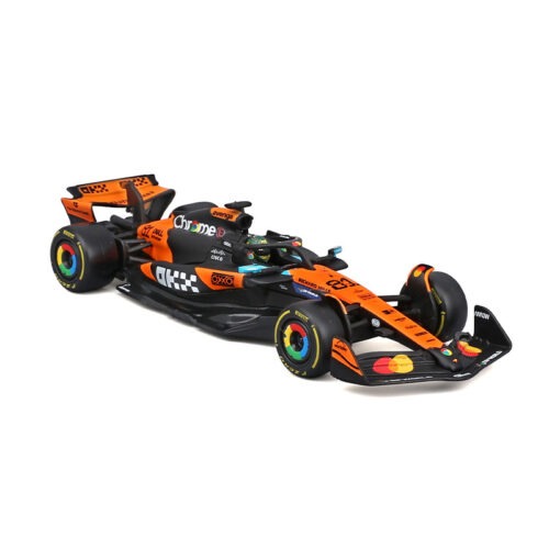 Side profile shot of 1:43 Bburago MCL39‑style die‑cast racing replica